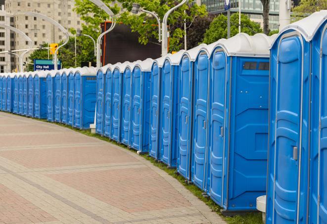 hygienic portable restrooms lined up at a music festival, providing comfort and convenience for attendees in Buhl, ID